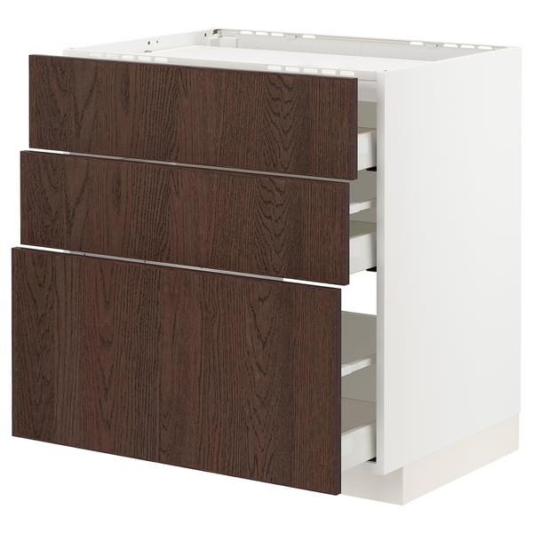 Armoire METOD blanche avec tiroirs en sinarp brun foncé.