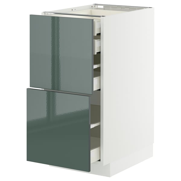 Une armoire de cuisine ikea METOD moderne, vert brillant, avec trois tiroirs et un design élégant.