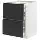 Une armoire de cuisine blanche moderne avec des tiroirs noirs, dotée de poignées intégrées élégantes et d’un design épuré et minimaliste.