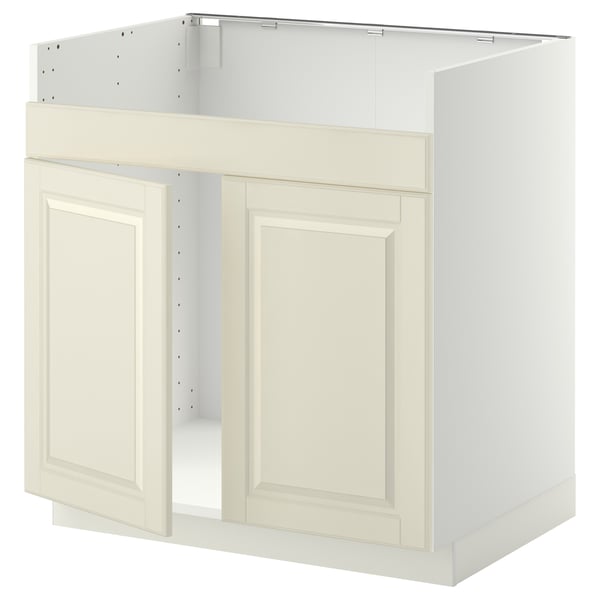 Meuble de cuisine Ikea METOD, blanc cassé, rectangulaire avec portes crème, bords biseautés.