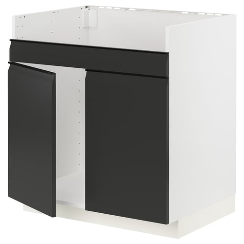 Armoire de cuisine moderne en noir et blanc avec un design élégant et minimaliste et des poignées métalliques.