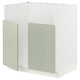 Meuble de cuisine METOD en vert avec panneaux gris clair, forme rectangulaire, design de bord.