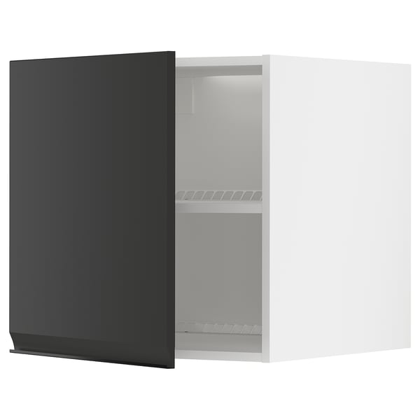 Un meuble de cuisine METOD noir avec deux étagères et une porte réversible.