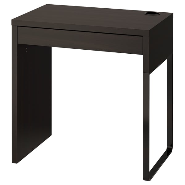 Bureau MICKE noir : élégant, petit, rectangulaire, avec un tiroir, pieds en métal robustes.