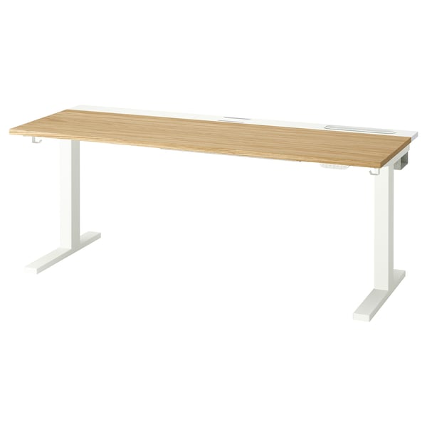 Un bureau assis/debout MITTZON avec un plateau en bois clair et des pieds blancs. Il est doté de deux moteurs et d’une hauteur réglable.