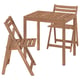 Un ensemble de table et de chaises d’extérieur en bois d’acacia brun NÄMMARÖ.