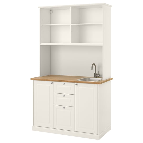 La kitchenette ÖNNERUP dispose d’armoires blanches, d’un comptoir en bois, d’un évier à cuve unique et d’étagères ouvertes. Idéal pour les espaces compacts.