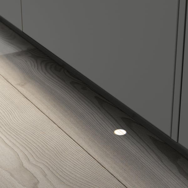 La fonction des lave-vaisselle projette une lumière sur le sol, signalant son fonctionnement.