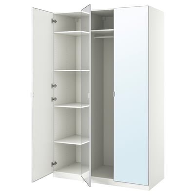 Une armoire IKEA PAX blanche avec portes miroirs et un intérieur vide.