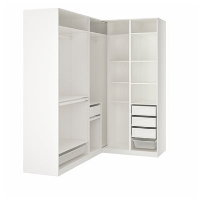Armoire d’angle blanche avec étagères et tiroirs ouverts.