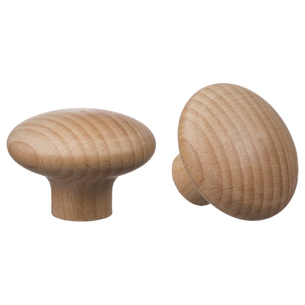 Deux boutons en bois de forme lisse et arrondie. Couleur et finition naturelles. Idéal pour les armoires ou les tiroirs, avec un design simple et fonctionnel.