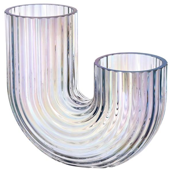 Un vase en verre RÄFFELBJÖRK, transparent avec un scintillement arc-en-ciel, doté d’un design fluide et rainuré, parfait pour les fleurs ou comme sculpture décorative.