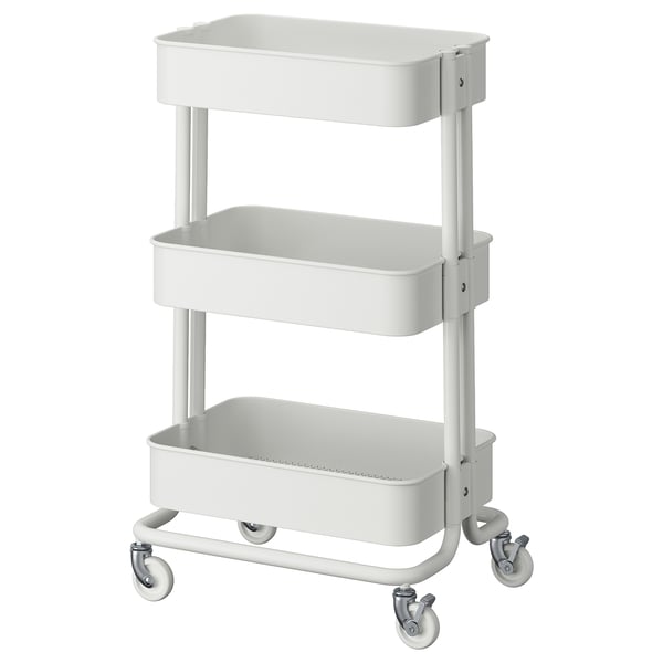 Ikea RÅSKOG : chariot de rangement compact, blanc, à 3 niveaux sur roulettes pour les petits espaces, design robuste.