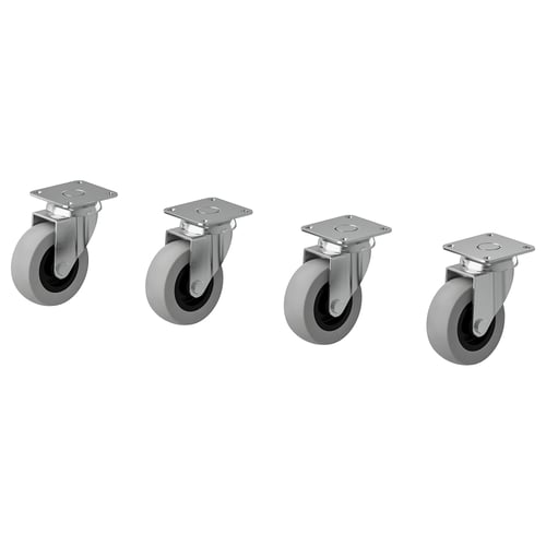 Quatre roulettes RILL grises, deux avec freins, des supports métalliques, des roues circulaires avec des bandes de roulement en caoutchouc, conçues pour faciliter le déplacement des meubles.