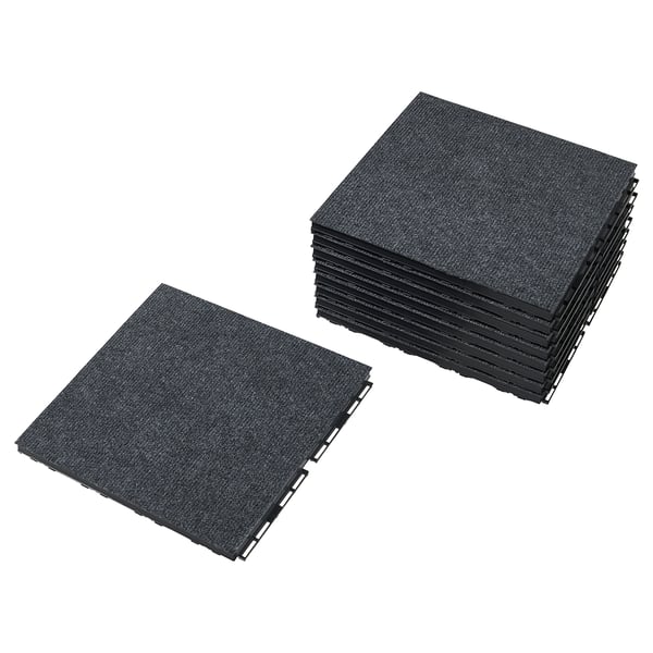 Pile de carreaux de sol RUNNEN noirs, imbriqués, de forme carrée, surface texturée.