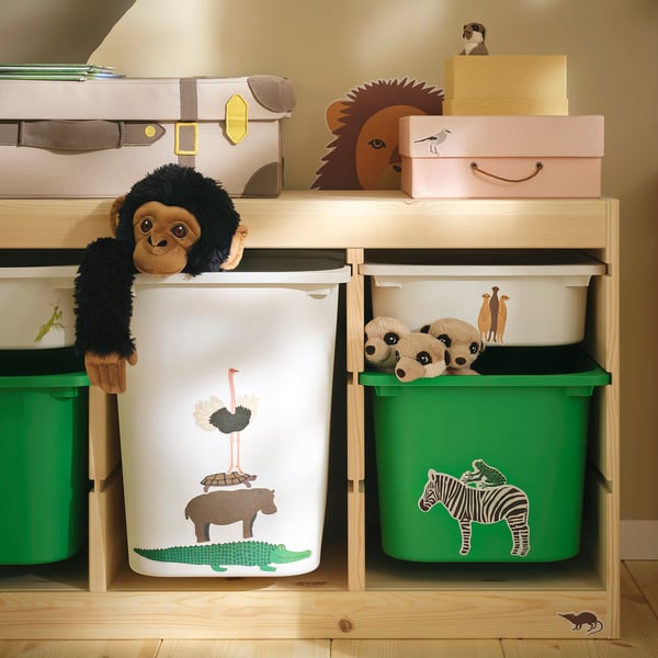 Étagère colorée pour enfants avec bacs et autocollants : boîtes et statue, poubelle pour singes, poubelles pour zèbres et girafes.
