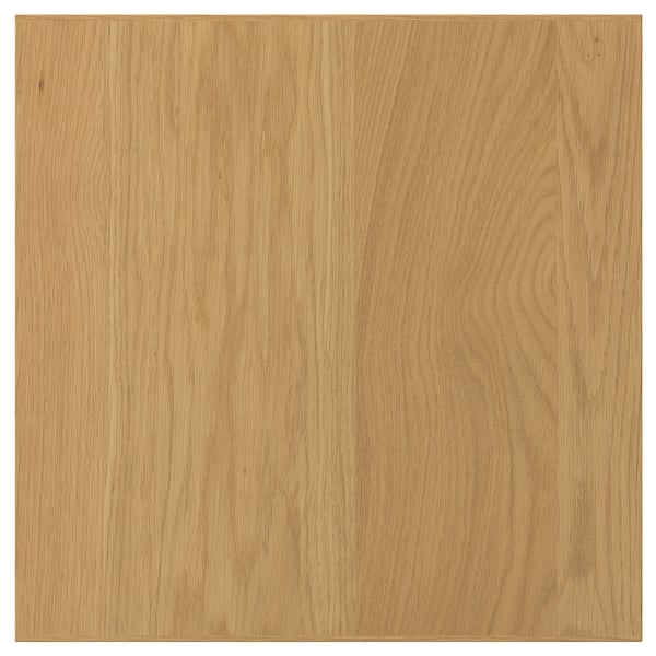 Un panneau carré en bois SINARP de couleur chêne naturel. Il est fabriqué en placage de chêne avec un bord en chêne massif. Le design est simple et direct.