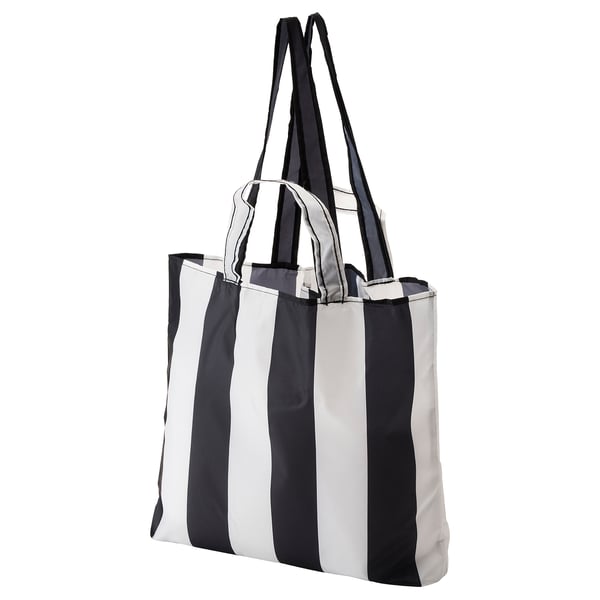 Sac SKYNKE, rayures noires et blanches, pliable, polyester recyclé, design à l’épaule.