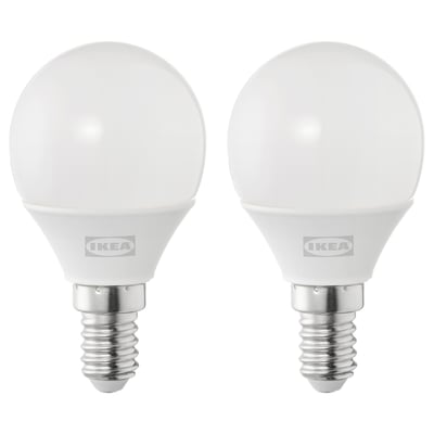 Deux ampoules led ikea, rondes et blanches, en plastique.