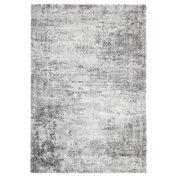 Tapis rectangulaire gris, à poils ras, design chiné, durable et doux.