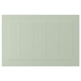 Une porte d’armoire STENSUND rectangulaire verte avec des panneaux rainurés. Il est fabriqué à partir de panneaux de fibres et recouvert de peinture polyuréthane et acrylique.