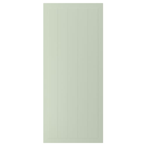 Une porte d’armoire STENSUND verte avec des rainures verticales. Il est rectangulaire et fabriqué en panneaux de fibres avec une finition laquée.