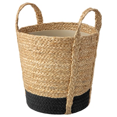 Panier tressé TÄRNMÅS, beige et noir, forme ronde avec deux poignées.