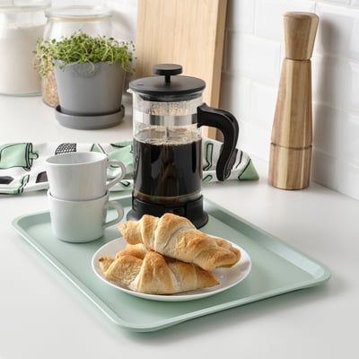 Plateau vert avec viennoiseries, café et piston, intérieur/extérieur, lavable au lave-vaisselle. Ou plaque à pâtisserie verte avec café et piston, lavable au lave-vaisselle.