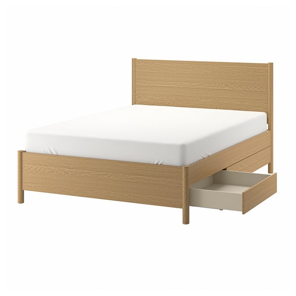 Lit TONSTAD : bois clair, rectangulaire, design simple avec tiroirs sous le lit.