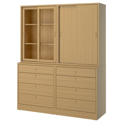 Unité de rangement en chêne TONSTAD : commode à 4 tiroirs, armoire avec portes coulissantes, grain de bois clair, design classique, grand espace de rangement.