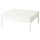 Une table basse TONSTAD blanche avec deux tiroirs. Il a un design élégant et carré avec un style moderne et minimaliste.