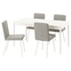 Ensemble de salle à manger moderne avec table TONSTAD et quatre chaises blanches, avec des sièges rembourrés et des bords arrondis et élégants.