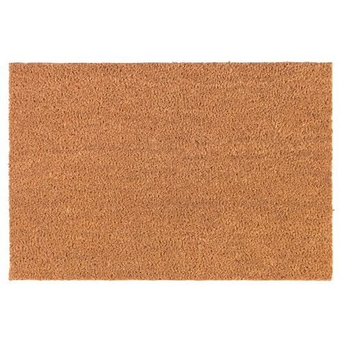 Paillasson en fibre de coco marron de forme rectangulaire avec texture naturelle.