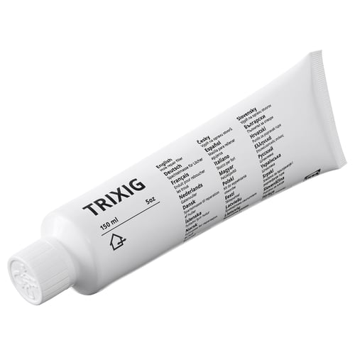 Tube de remplissage de réparation de trous TRIXIG. Multi-langues. Répare les petits trous.