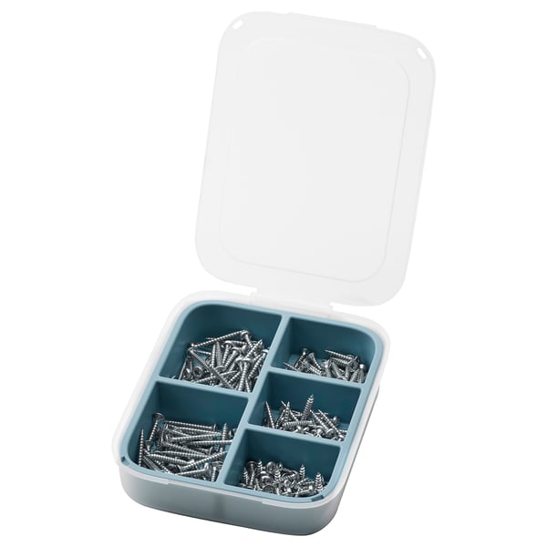Boîte à outils en plastique bleu ouverte avec vis dans les compartiments.