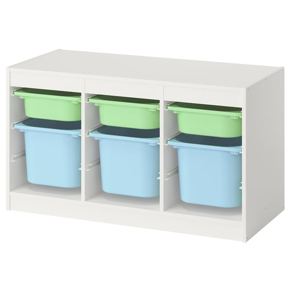 Unité TROFAST blanche avec des bacs colorés verts, bleus et gris. Idéal pour organiser les jouets des enfants.