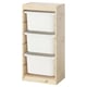Une unité de rangement ikea TROFAST avec des bacs en plastique blanc dans un cadre en bois clair.