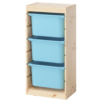 Ikea TROFAST : cadre en bois léger, 3 bacs en plastique bleu, façade ouverte, rangement simple.