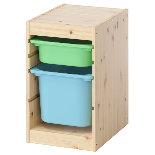 Unité de rangement pour enfants TROFAST en bois naturel avec des conteneurs bleus et verts.