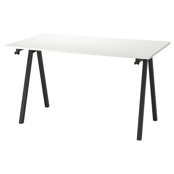 Bureau Trottén blanc, pieds en métal noir. Conception moderne en a, parfaite pour les petits espaces.
