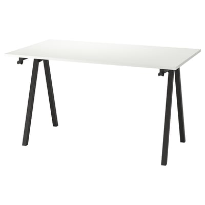 Bureau Trottén blanc, pieds en métal noir. Conception moderne en a, parfaite pour les petits espaces.