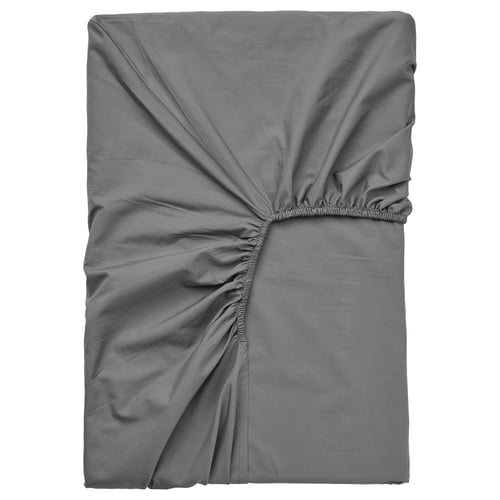 Un drap-housse gris ULLVIDE en tissage percale, avec bords élastiques, conçu pour les matelas jusqu’à 8 cm d’épaisseur.