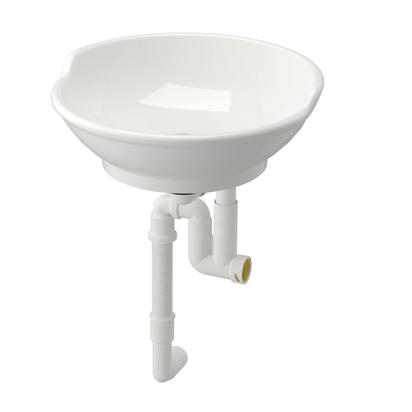 Lavabo rond en céramique blanche au design traditionnel, dos surélevé et plomberie de soutien.