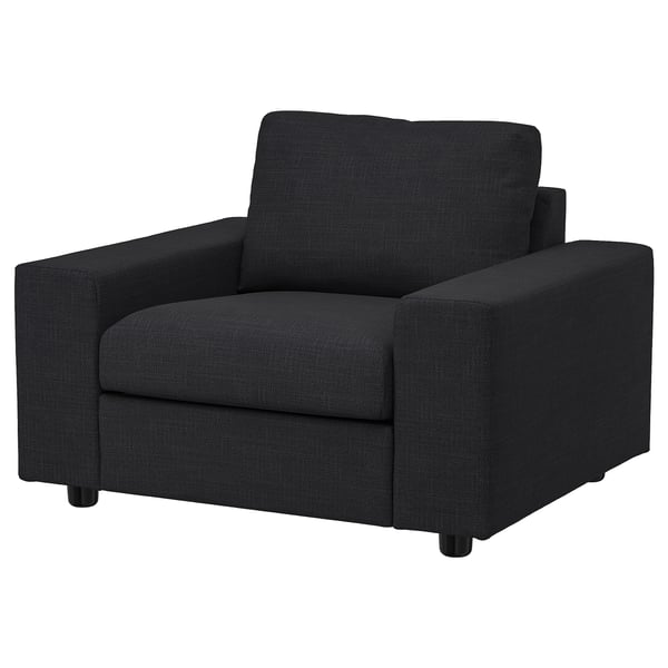 Fauteuil VIMLE noir, design moderne et épuré, confortable pour s’asseoir.