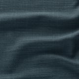 Gros plan du tissu tissé, mettant en valeur un mélange texturé, durable mais doux.