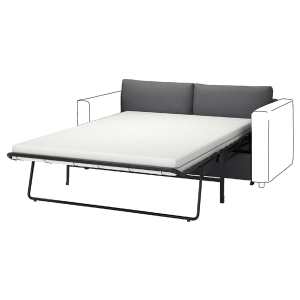 Le canapé-lit gris VIMLE, au design moderne avec structure en métal noir, transformé en lit.