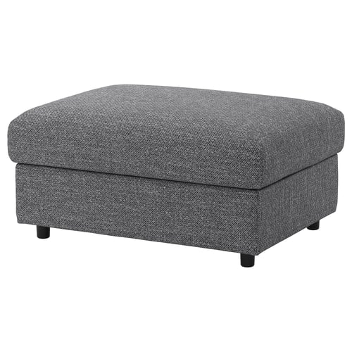 Un repose-pieds VIMLE gris avec une housse amovible pour un lavage facile. Sa forme carrée et ses pieds noirs offrent un design moderne.