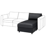 Un canapé VIMLE en cuir gris avec une chaise longue de rangement. Il s’agit d’un design moderne avec des lignes épurées et des coussins de soutien.