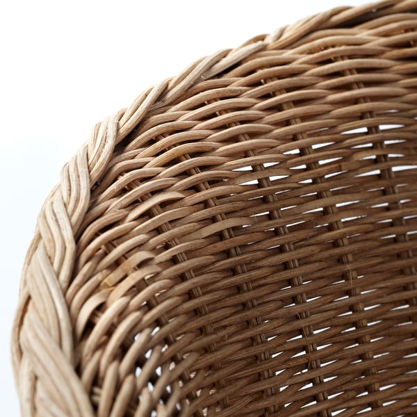 Close-up van ingewikkeld geweven rotan stoel; Fijn vakmanschap en natuurlijke textuur.