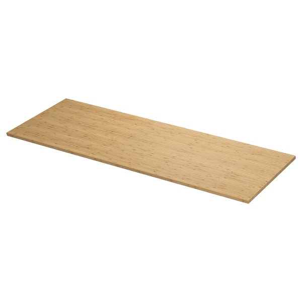 Een lang, rechthoekig aanrechtblad voor de badkamer met de naam ÅLSKEN in de kleur van natuurlijke bamboe met een glad, afgewerkt oppervlak.